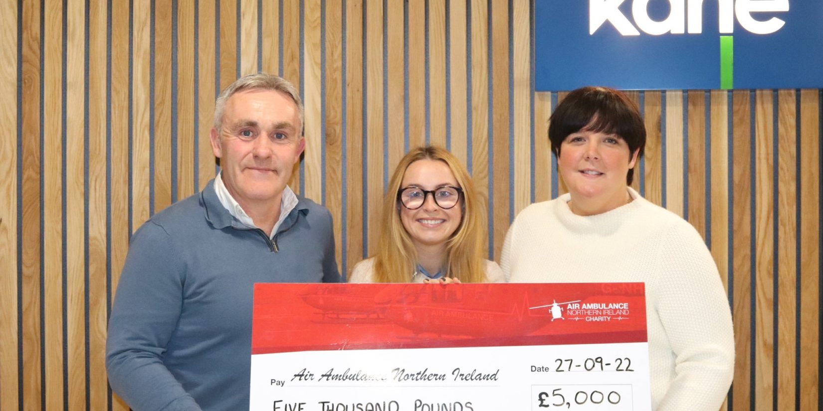 Pictured (L-R): John McMullan (Kane Group), Amy Henshaw (Air Ambulance NI) and Catriona Donnelly (Kane Group)