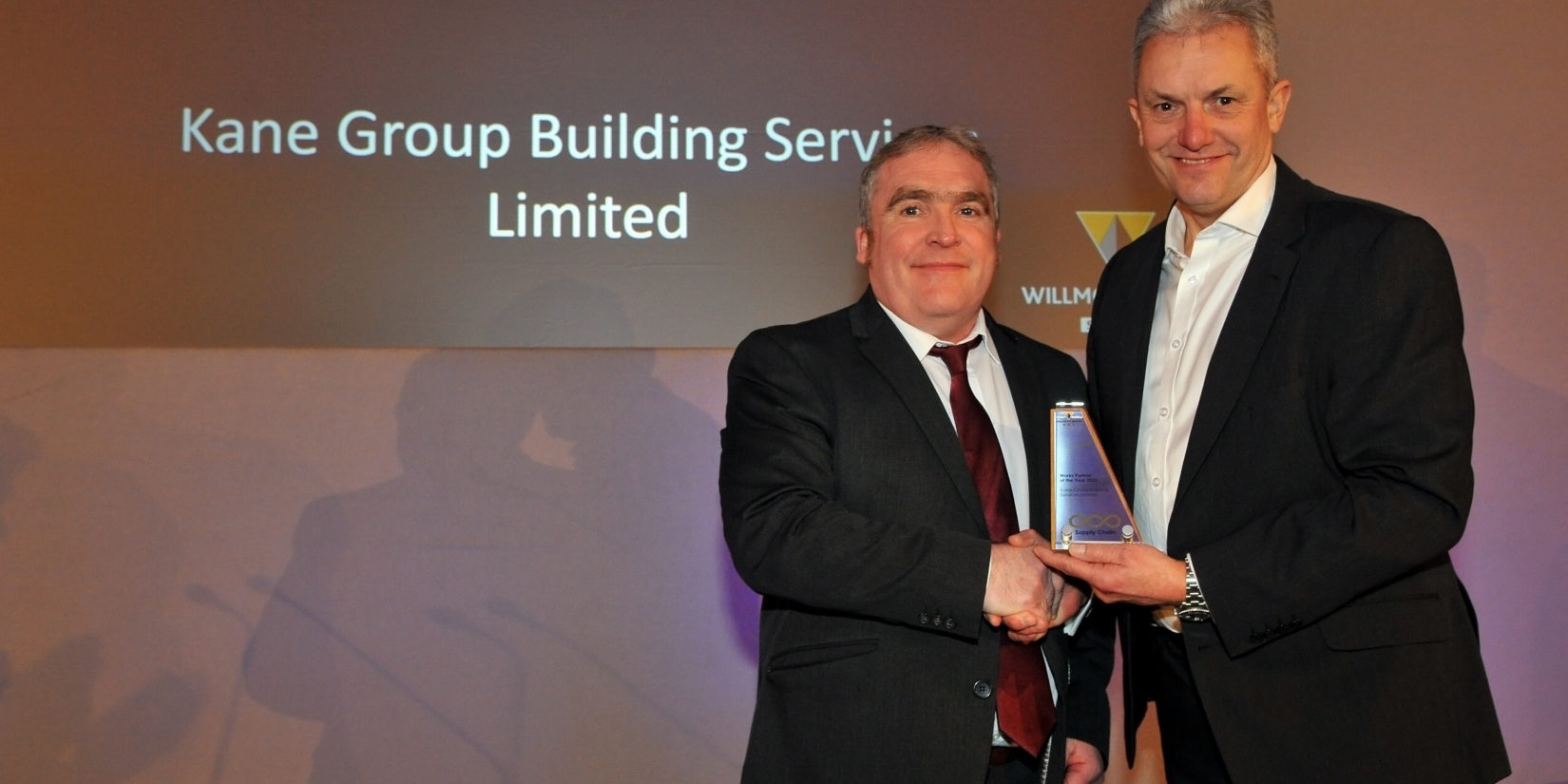 Pictured above with the award: Cathal McMullan and Chris Tredget (Willmott Dixon’s Managing Director, London & East)