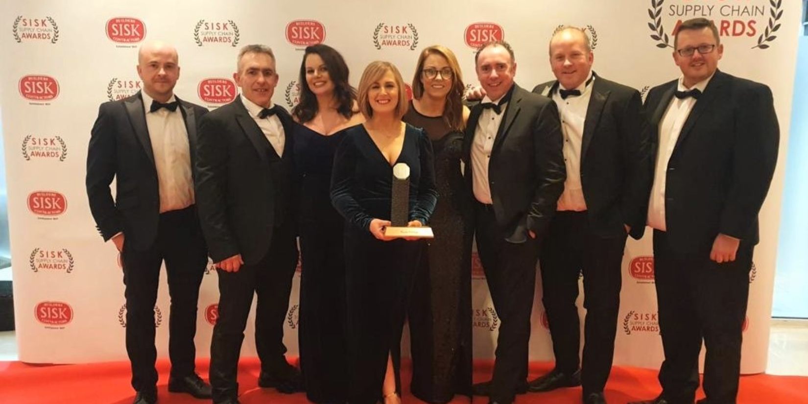 Pictured above with the award (L-R): Mark Robinson, Marty McMullan, Lauren McMullan-Carville, Aine McEvoy, Sarah Nicol, Daniel O'Rourke, James Murray and Colin Telford