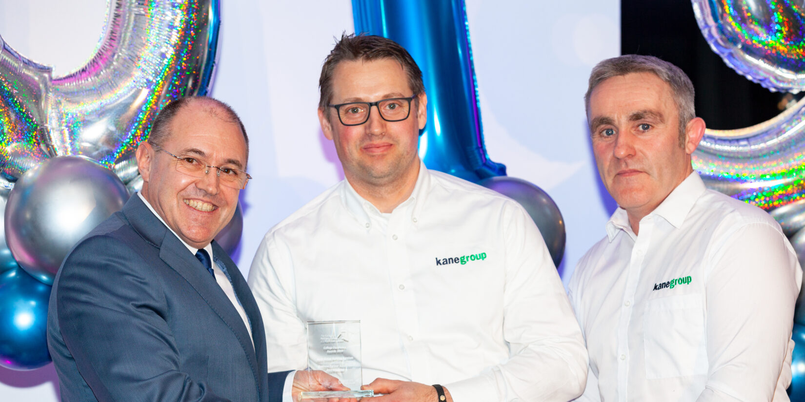 Pictured L-R: CONEL Principal Kurt Hintz presenting the award to Craig Smith and John McMullan from Kane.